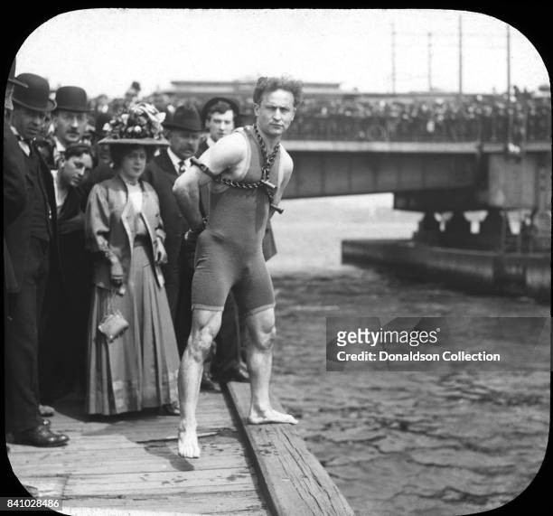 Magician Harry Houdini jumps from Harvard Bridge, Boston, Massachusetts April 30, 1908.