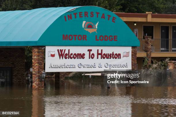 Interstate Motor Lodge, Welcome to Houston sign is seen in from of the hotel has taken on water during Hurricane Harvey, Wednesday, August 30, 2017.