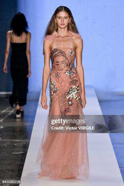 Model walks the runway during Fabiana Milazzo fashion show as part of Sao Paulo N44 Fashion Week Spring/Summer 2018 on August 28, 2017 in Sao Paulo,...