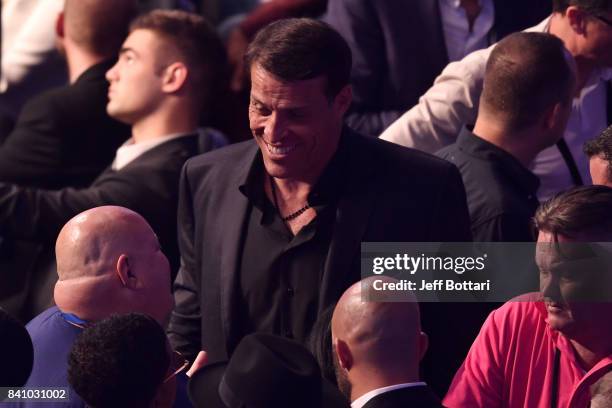 Author and motivational speaker Tony Robbins attends the super welterweight boxing match between Floyd Mayweather Jr. And Conor McGregor on August...