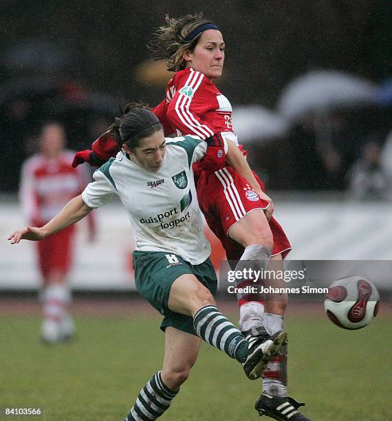 December 21: Tanja Woerle of Bayern in action with Annemieke Kiesel of Duisburg during the women DFB Cup football match FC Bayern Muenchen v FCR 2001...