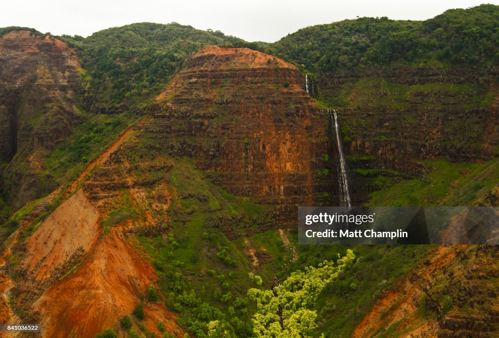 Aerial from Helicopter of rugged Waimea Canyon Grand Canyon of Pacific