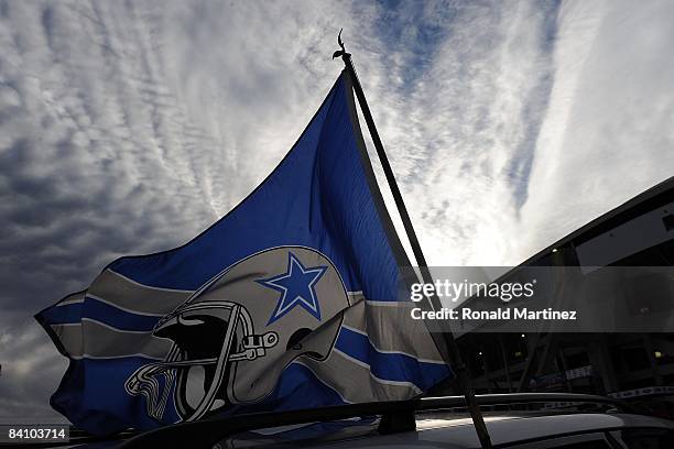 Dallas Cowboys flags fly outside Texas Stadium before the last home game against the Baltimore Ravens on December 20, 2008 in Irving, Texas. The...