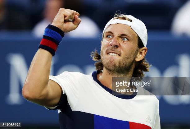 Lucas Pouille of France reacts against Jared Donaldson of the United States during their second round Men's Singles match on Day Three of the 2017 US...