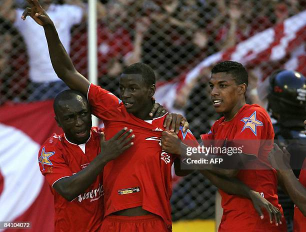 Colombian footballer Adrian Ramos of Cali's America celebrates with his teammates after scoring against Deportivo Medellin during the Colombian...