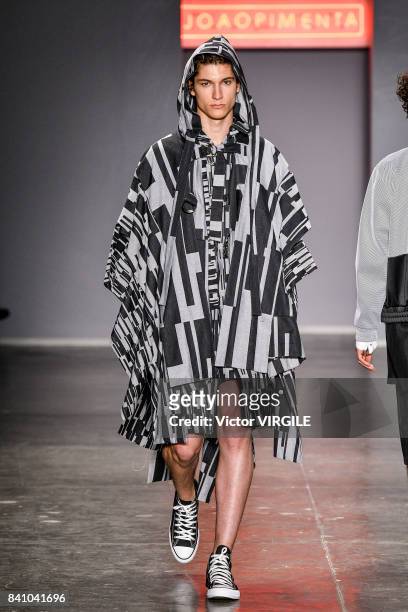 Model walks the runway during Joao Pimenta fashion show as part of Sao Paulo N44 Fashion Week Spring/Summer 2018 on August 28, 2017 in Sao Paulo,...