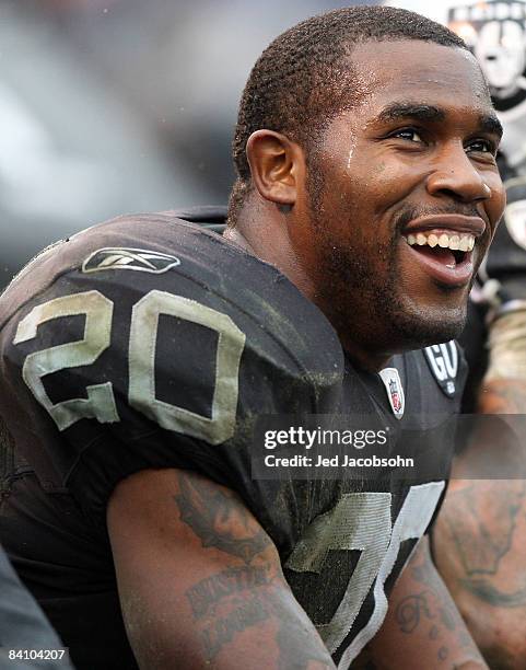 Darren McFadden of the Oakland Raiders looks on against the Houston Texans during an NFL game on December 21, 2008 at the Oakland-Alameda County...