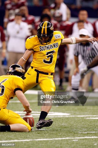 Britt Barefoot of the Southern Mississippi Golden Eagles kicks a field goal to tie the game against the Troy Trojans in the R+L Carriers New Orleans...