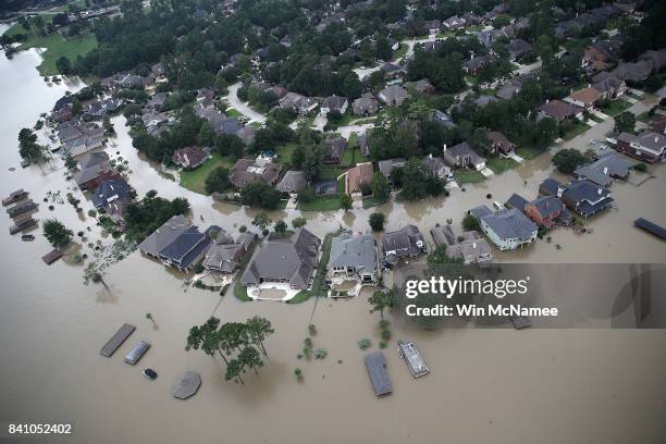 Flooded homes are shown near Lake Houston following Hurricane Harvey August 30, 2017 in Houston, Texas. The city of Houston is still experiencing...