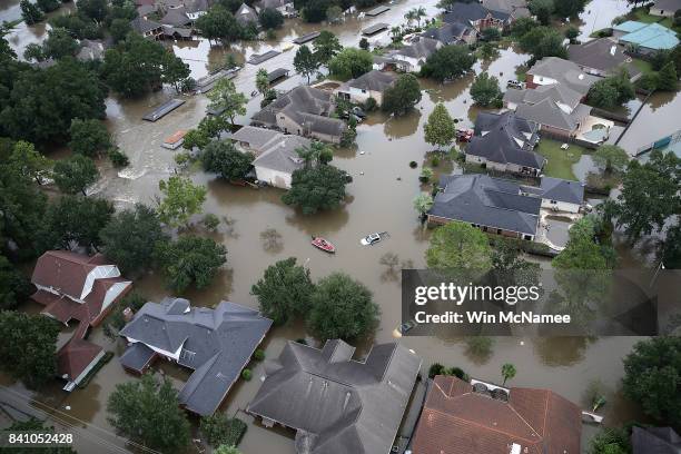 Flooded homes are shown near Lake Houston following Hurricane Harvey August 30, 2017 in Houston, Texas. The city of Houston is still experiencing...