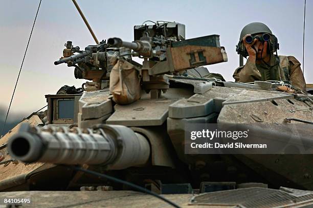 Israeli Tank Commanders 131 Israeli Tanks Patrol The Gaza Border Stock Photos, High-Res ...