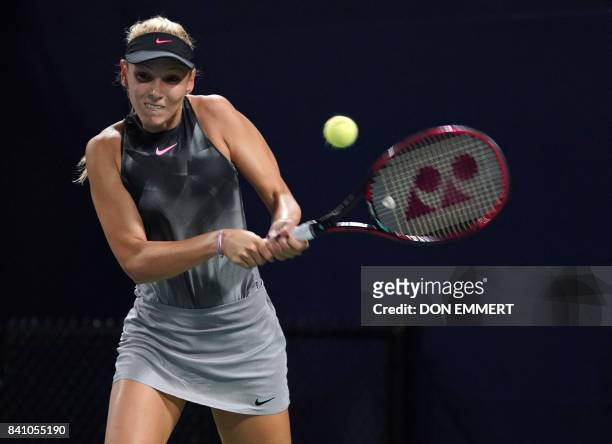 Donna Vekic of Croatia hits a return to Peng Shuai of China during their 2017 US Open Women's Singles match at the USTA Billie Jean King National...