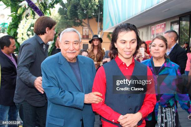 Joao Aguilera, son of Juan Gabriel visits the statue of his father at Garibaldi Square on August 25, 2017 in Mexico City, Mexico.