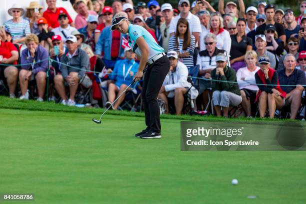 Brooke Henderson watches her putt on the green of the 18th hole during the final round of the Canadian Pacific Women's Open on August 27, 2017 at The...