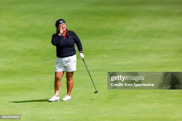 Christina Kim calls out a warning after hitting her ball towards the crowd on the 9th hole during the final round of the Canadian Pacific Women's...