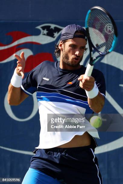 Feliciano Lopez of Spain returns a shot against Andrey Kuznetsov of Russia during their first round Men's Singles match on Day Three of the 2017 US...