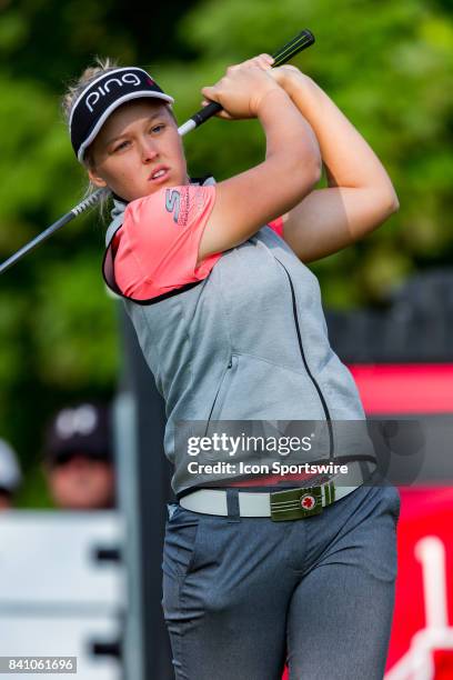 Brooke Henderson takes a practice swing before teeing off on the 1st hole during the third round of the Canadian Pacific Women's Open on August 26,...