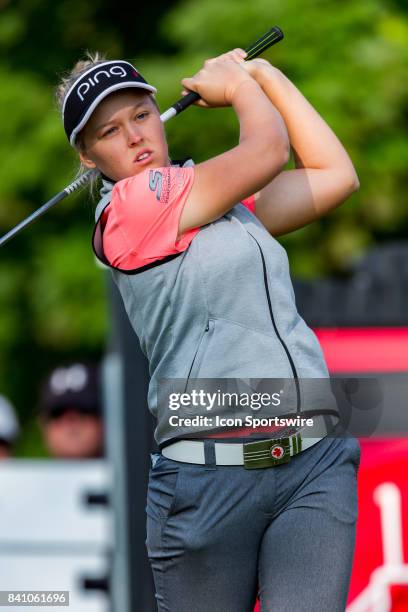 Brooke Henderson takes a practice swing before teeing off on the 1st hole during the third round of the Canadian Pacific Women's Open on August 26,...