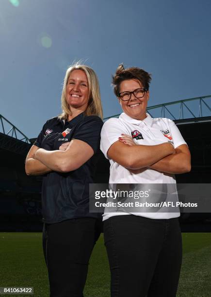 Allies' coach Bec Goddard and Victoria's coach Debbie Lee pose during the NAB AFL Women's State of Origin Captains and Coaches press conference at...