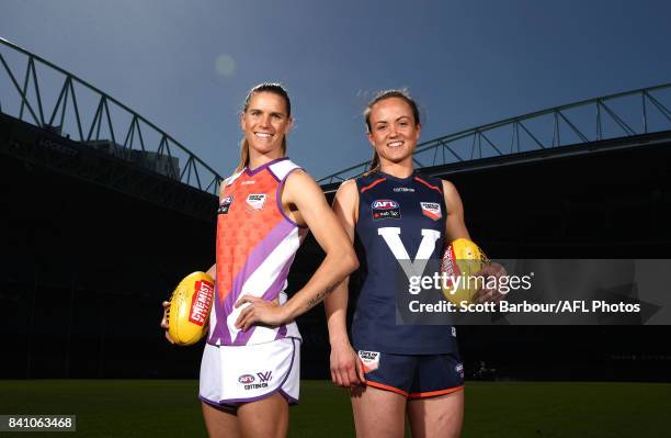 Allies' captain Chelsea Randall and Victoria's captain Daisy Pearce pose during the NAB AFL Women's State of Origin Captains and Coaches press...