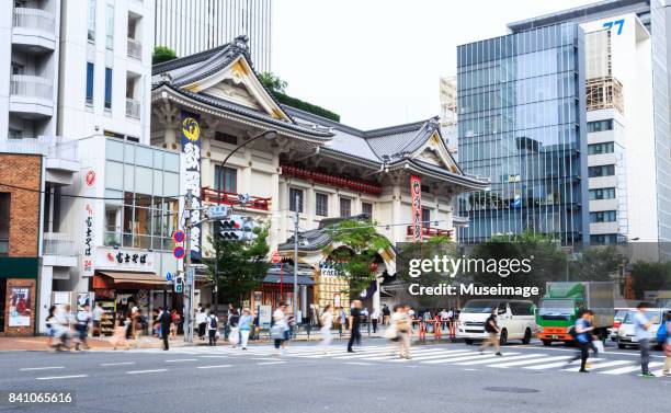 the pedestrians are crossing the crossroads of the kabuki theater - kabuki za stock pictures, royalty-free photos & images