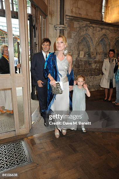 Jamie Hince, Kate Moss and daughter Lila Grace attend the wedding of Leah Wood and Jack MacDonald at Southwark Cathedral on June 21, 2008 in London,...