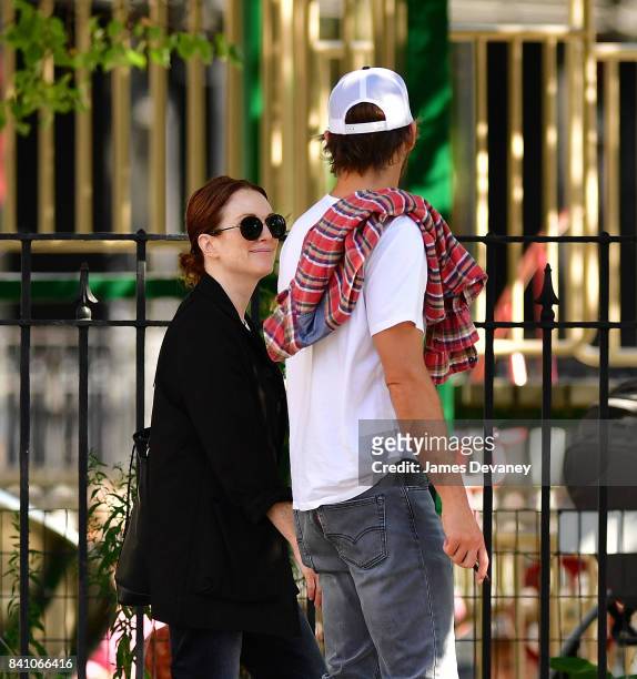 Julianne Moore and Bart Freundlich leave Cafe Cluny on August 30, 2017 in New York City.