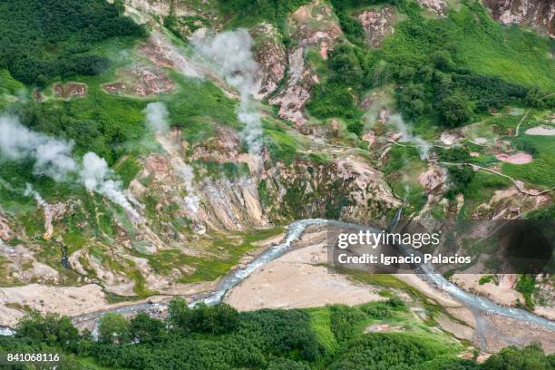 fumaroles, valley of the geysers, kamchatka peninsula - fumarole stock pictures, royalty-free photos & images