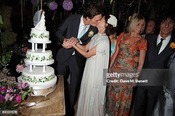 Leah Wood and Jack MacDonald with Jo and Ronnie Wood attend their wedding reception dinner at HolmWood on June 21, 2008 in Kingston, London, England.