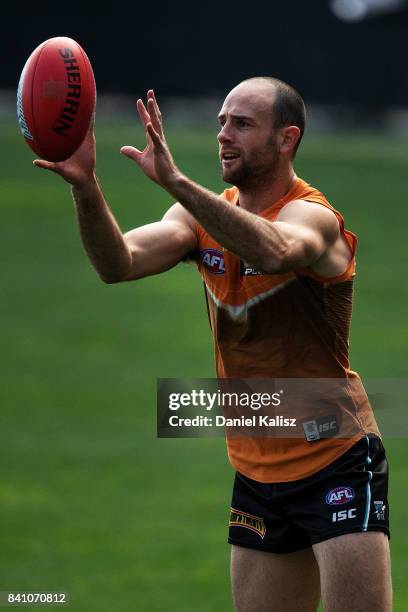 Matthew Broadbent of the Power marks the ball during a Port Power AFL training session at the Adelaide Oval on August 31, 2017 in Adelaide, Australia.