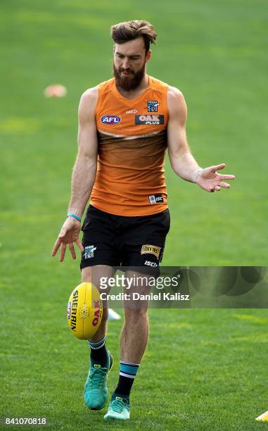 Charlie Dixon of the Power kicks the ball during a Port Power AFL training session at the Adelaide Oval on August 31, 2017 in Adelaide, Australia.