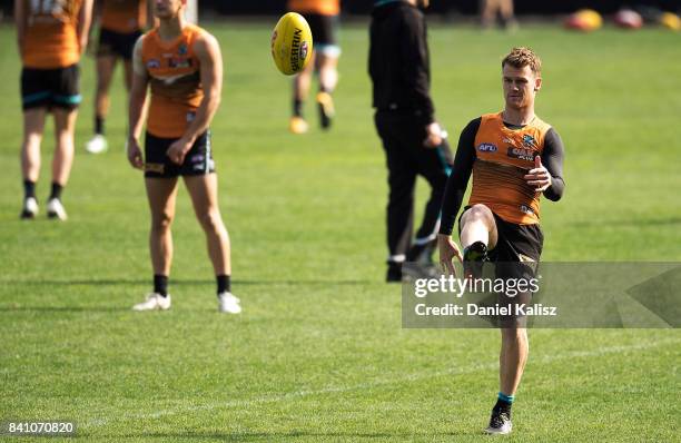 Robbie Gray of the Power kicks the ball during a Port Power AFL training session at the Adelaide Oval on August 31, 2017 in Adelaide, Australia.