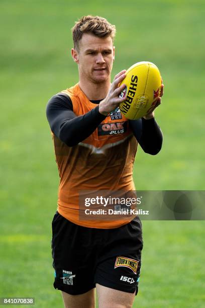Robbie Gray of the Power marks the ball during a Port Power AFL training session at the Adelaide Oval on August 31, 2017 in Adelaide, Australia.