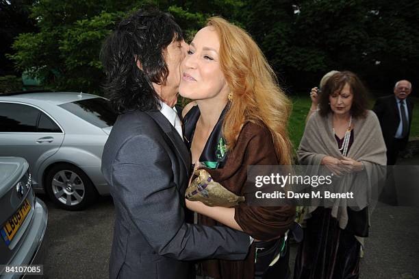 Ronnie Wood and Jerry Hall attend the wedding reception of Leah Wood and Jack MacDonald at Holm Wood on June 21, 2008 in London, England.