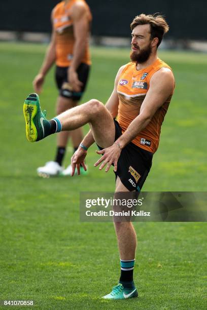 Charlie Dixon of the Power kicks the ball during a Port Power AFL training session at the Adelaide Oval on August 31, 2017 in Adelaide, Australia.