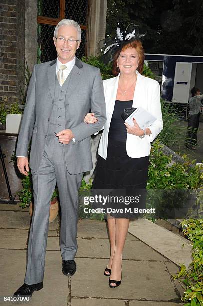 Paul O'Grady and Cilla Black attend the wedding reception of Leah Wood and Jack MacDonald at Holm Wood on June 21, 2008 in London, England.