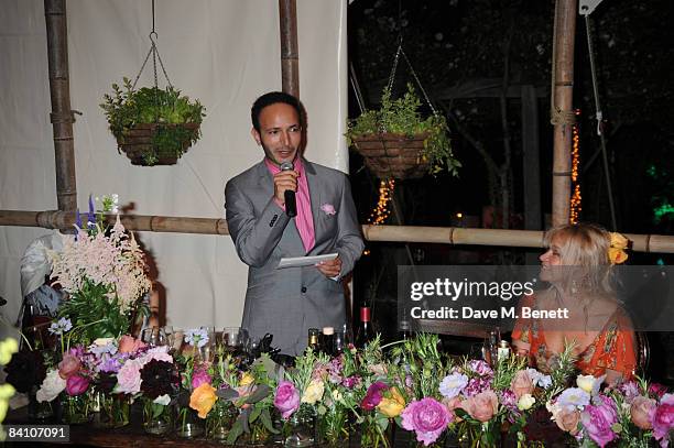 Guest speaks with Jo Wood at Leah Wood and Jack MacDonald's wedding reception dinner at HolmWood on June 21, 2008 in Kingston, London, England.