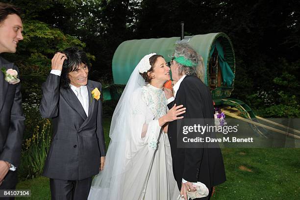 Ronnie Wood, Jack MacDonald, Leah Wood and Keith Richards attend the wedding reception of Leah Wood and Jack MacDonald at Holm Wood on June 21, 2008...