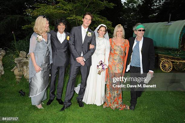 Ronnie Wood, Jack MacDonald, Leah Wood, Jo Wood and Keith Richards attend the wedding reception of Leah Wood and Jack MacDonald at Holm Wood on June...
