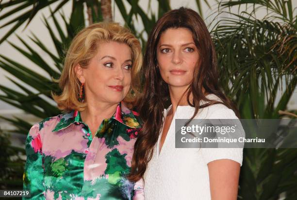 Actresses Catherine Deneuve and Chiara Mastroianni attend the Un Conte de Noel photocall at the Palais des Festivals during the 61st Cannes...