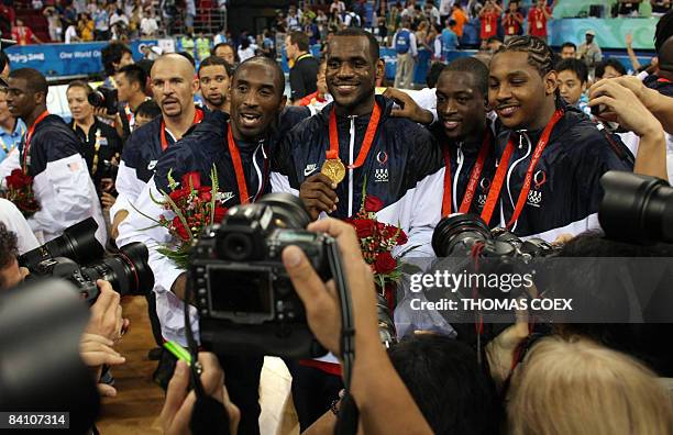 Jason Kidd, Kobe Bryant, LeBron James, Dwyane Wade and Carmelo Anthony pose with their medals after the men's basketball gold medal match of the...