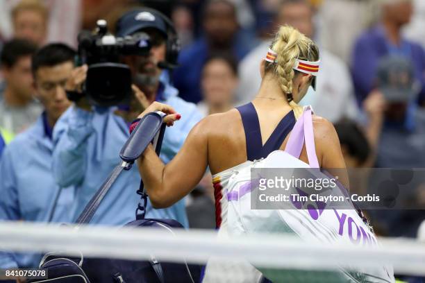 Open Tennis Tournament - DAY TWO. Angelique Kerber of German leaves the court after her loss against Naomi Osaka of Japan during the Women"u2019s...