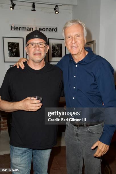 Photographer Chris Cuffaro and Filmmaker James Cameron attend the VIP Reception for Chris Cuffaro's New Exhibit "Greatest Hits: Martini Ranch at Mr....