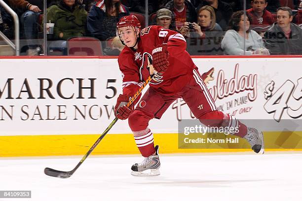 Kyle Turris of the Phoenix Coyotes passes the puck across ice against the Nashville Predators on December 18, 2008 at Jobing.com Arena in Glendale,...