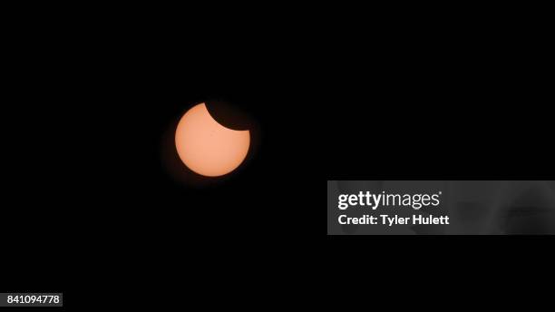 partial solar eclipse starts - annular eclipse stock pictures, royalty-free photos & images