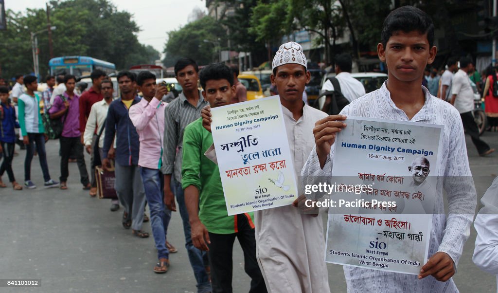 An India Muslim students during a protest rally against...