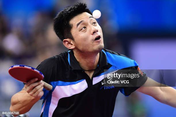 Zhang Jike of China competes in the Men's Team second stage matches of the 13th Chinese National Games at Wuqing sport center on August 30, 2017 in...