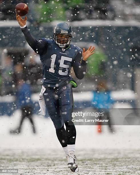 Seahawks quarterback Seneca Wallace throws the ball during the game between the Seattle Seahawks and the New York Jets at Qwest Field in Seattle,...