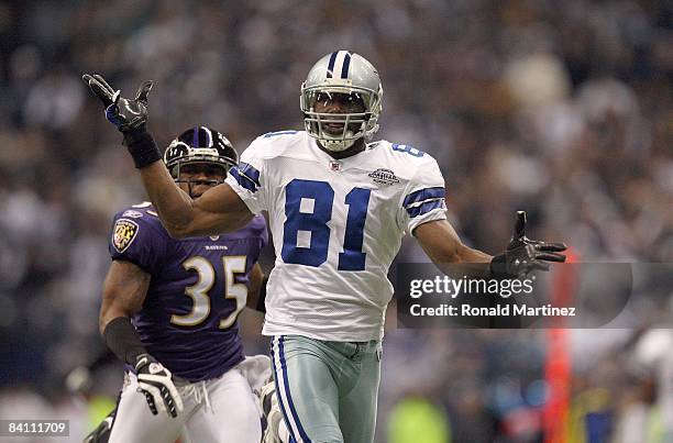 Terrell Owens of the Dallas Cowboys reacts after a play during their NFL game against the Baltimore Ravens at Texas Stadium on December 20, 2008 in...