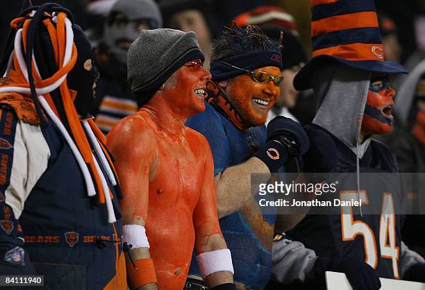 Fans of the Chicago Bears cheer on their team during a game against the Green Bay Packers on December 22, 2008 at Soldier Field in Chicago, Illinois.